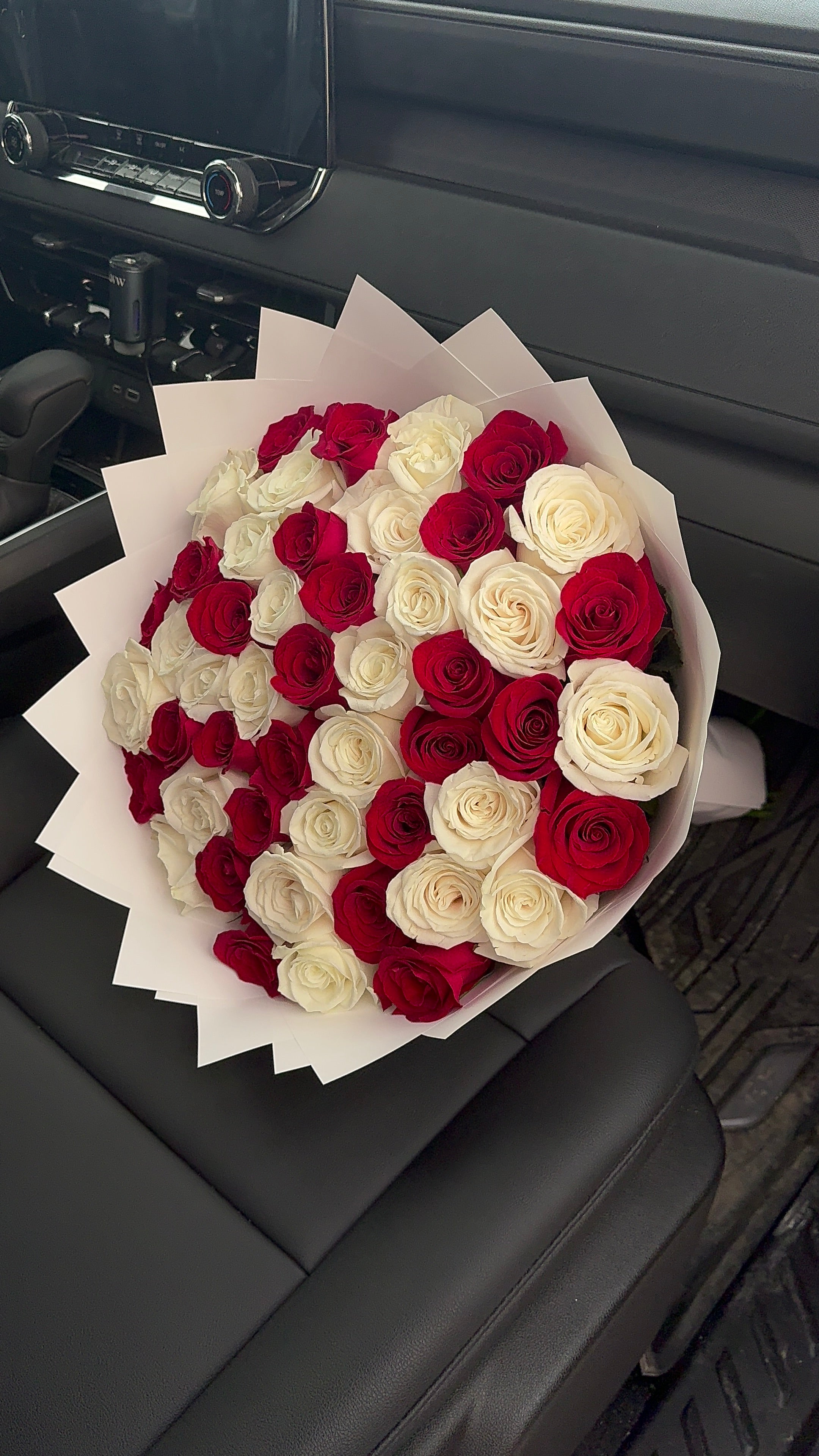 Premium 50 red and white rose bouquet Wrapped in white wrapping
